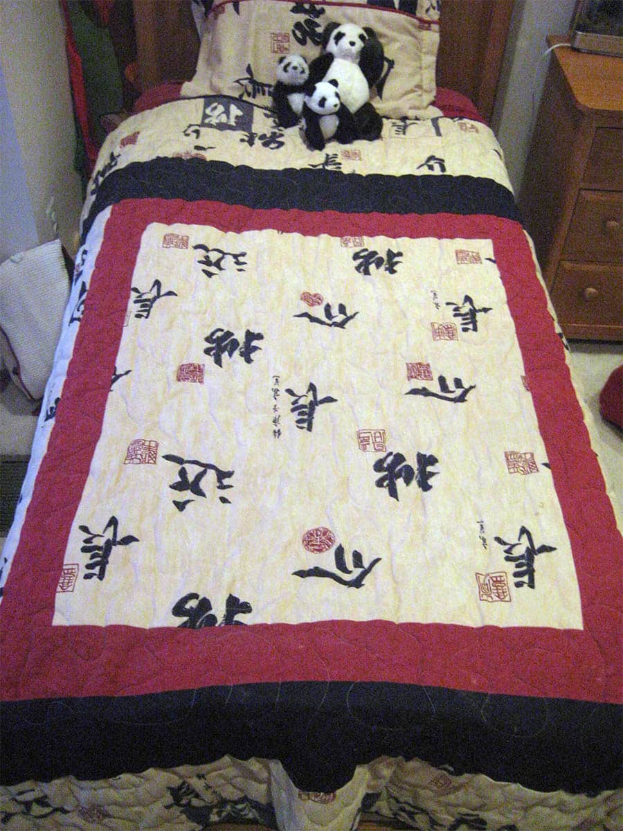 A custom quilt enhances the feel of a bedroom