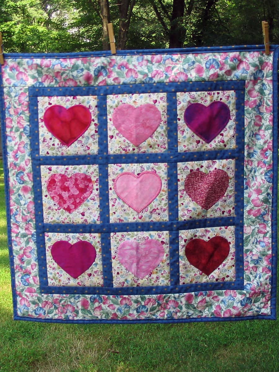 Hearts on a custom quilt show someone you love them