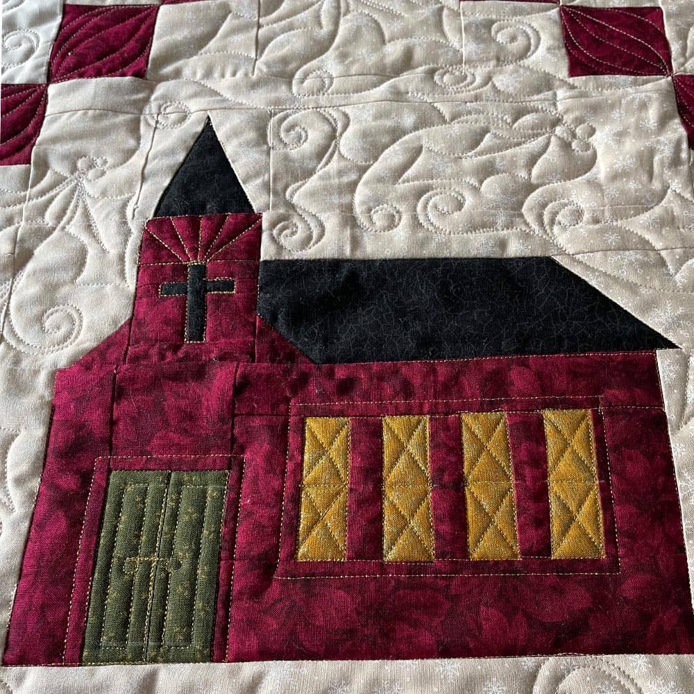quilting around a shape and embellishment